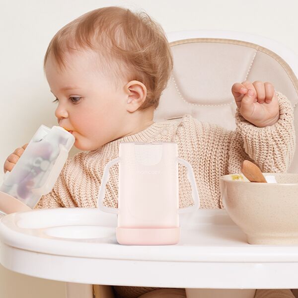 Momcozy Squeeze Proof Holder Babymatmaskin Rosa